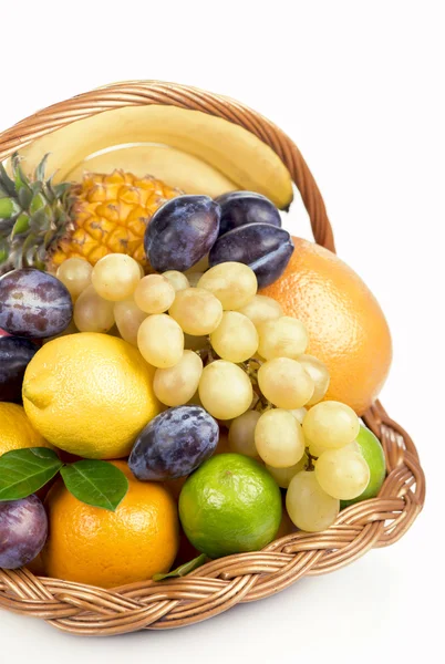 Fresh fruit in a wicker basket — Stock Photo, Image