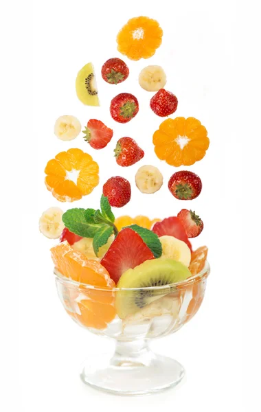 Glass bowl with fresh fruits salad — Stock Photo, Image