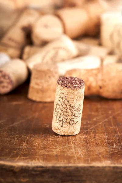 Bottle corks on the wooden background — Stock Photo, Image