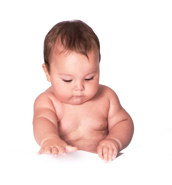 Little baby boy lying on the bed on white background — Stock Photo, Image