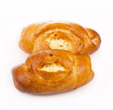 Freshly baked bun with cottage cheese isolated