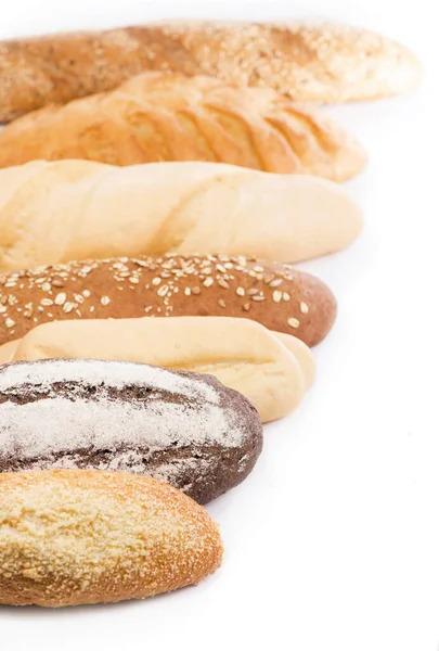 Assortimento Pane Fresco Sullo Sfondo Bianco — Foto Stock