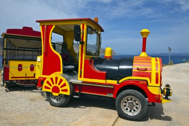 Red and yellow road train. clipart