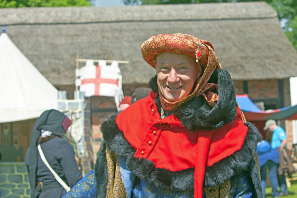 Man in medieval costume.