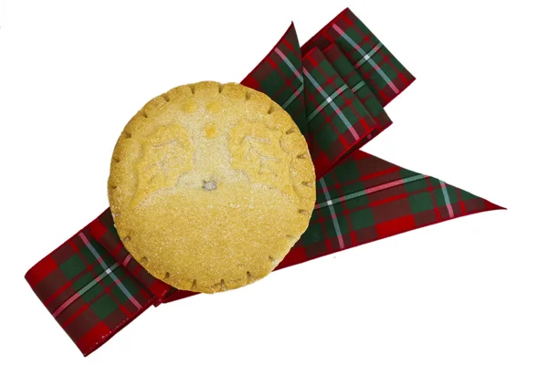 Mince pie and tartan ribbon. — Stock Photo, Image