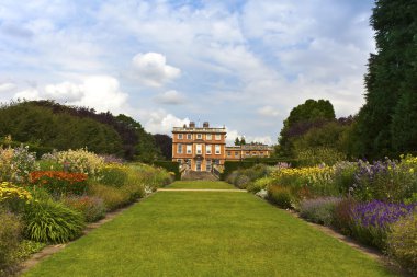English stately home and gardens. clipart