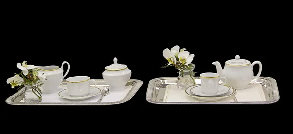 Tea trays isolated in black — Stock Photo, Image