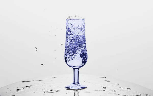 Glass Tumbler Bubbling Water White Background — Fotografia de Stock