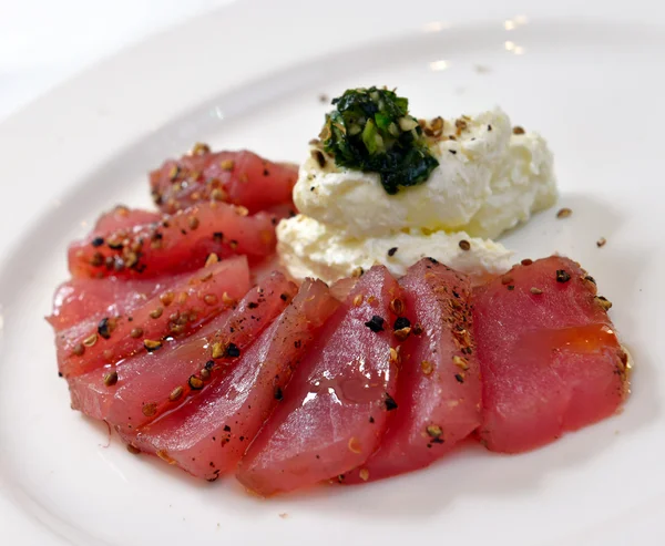 Tuna carpaccio with cheese garlic and basil — Stock Photo, Image