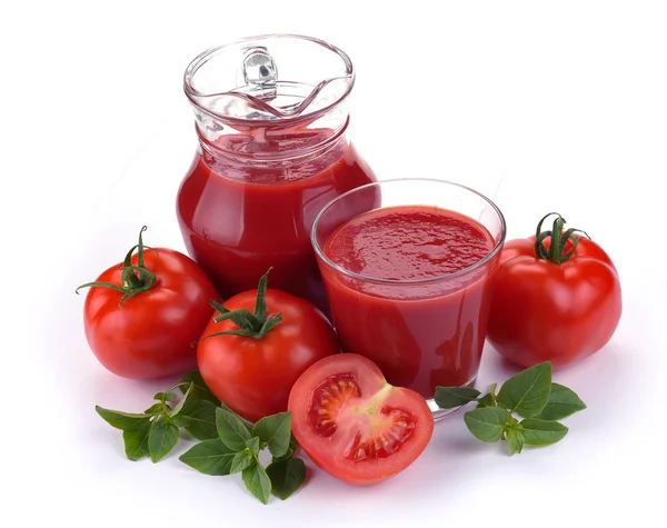 Jug, glass of tomato juice and fruits — Stock Photo, Image