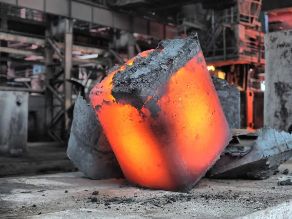 Steel ingot in the workspace — Stock Photo, Image