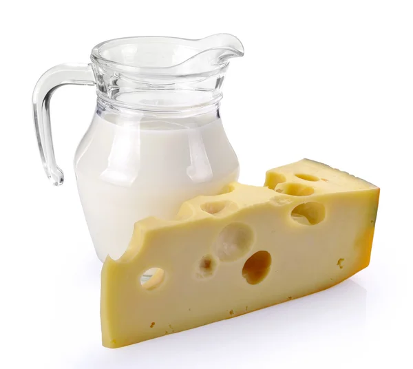 Pitcher of milk and cheese — Stock Photo, Image