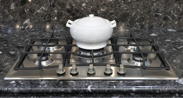 Ceramic pot on a gas stove — Stock Photo, Image