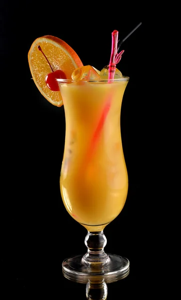 Orange cocktail with a cherry — Stock Photo, Image