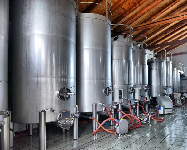 Stainless steel wine vats in a row — Stock Photo, Image