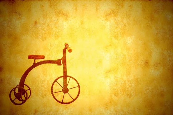Bakgrunden vintage antik trehjuling cykel — Stockfoto