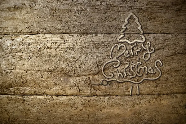 Silhouette albero di Natale su sfondo vecchio legno — Foto Stock