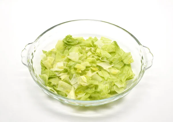 Chopped lettuce on glass bowl — Stock Photo, Image