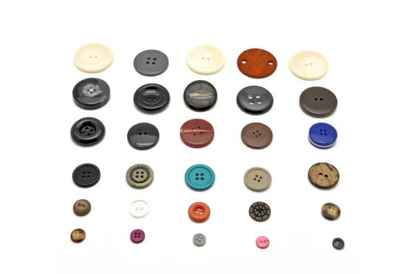 Sewing buttons from highest to lowest — Stock Photo, Image