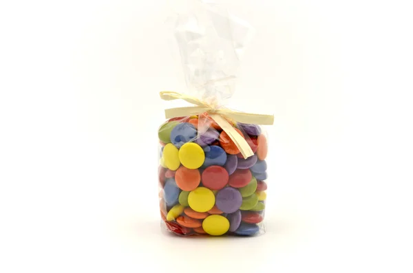 Multicolored chocolate candies in gift bag — Stock Photo, Image