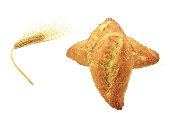 Dos panes de pan y espiga de trigo —  Fotos de Stock
