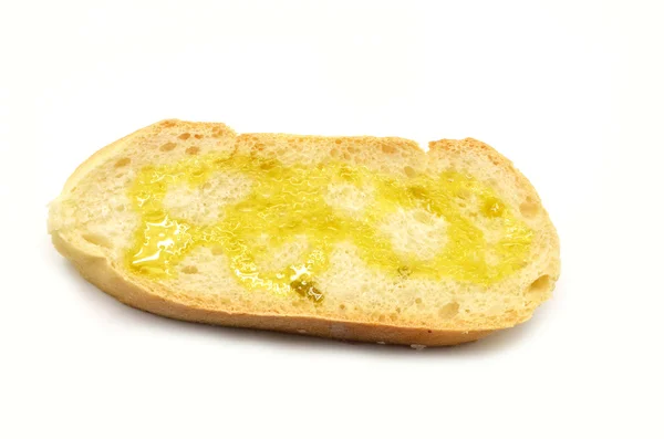 Fatia de pão com azeite extra virgem — Fotografia de Stock