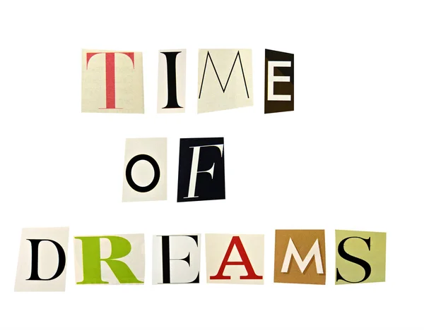 The phrase Time of Dreams formed with magazine letters on white background — Stock Photo, Image