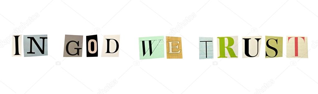 The phrase In God We Trust formed with magazine letters on white background