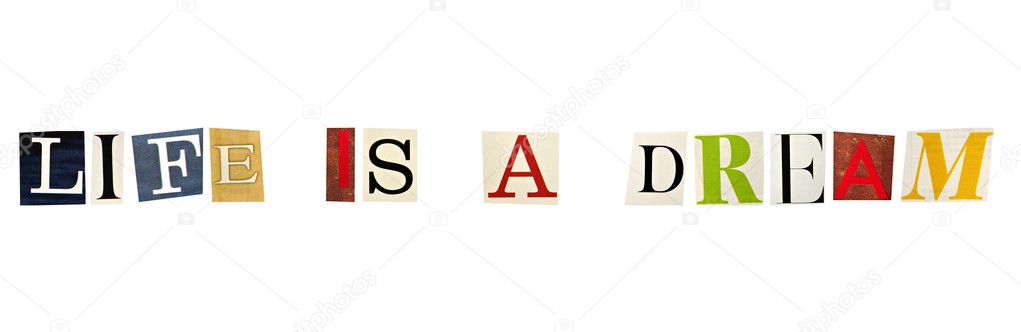 The phrase Life is a Dream formed with magazine letters on white background