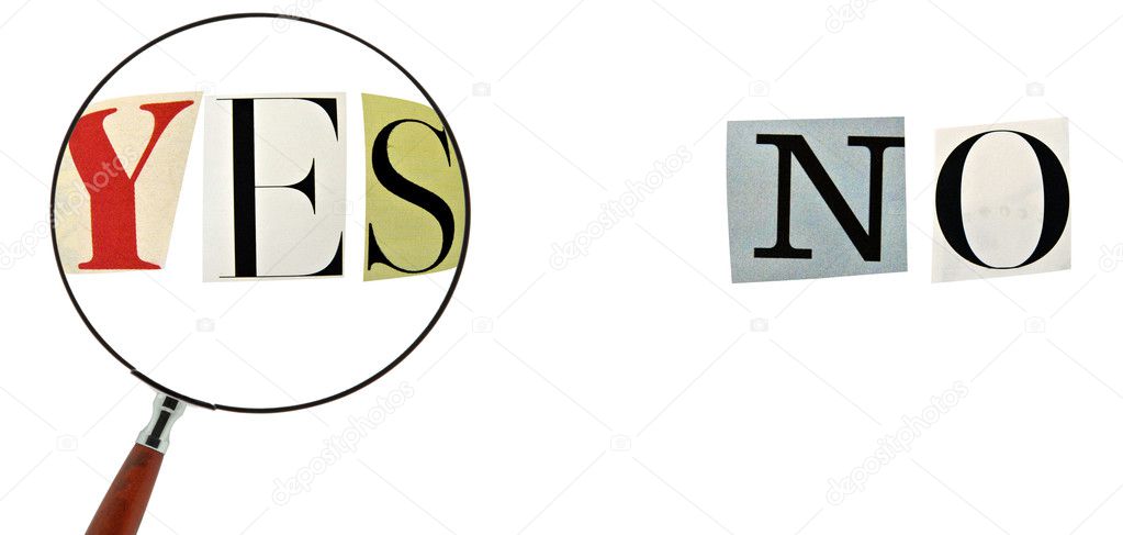 Yes and No Formed with magazine letters on a white background. Choosing the word YES with a magnifying glass.