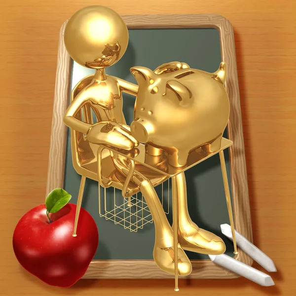 Estudante dourado pequeno com um banco porquinho na mesa da escola — Fotografia de Stock