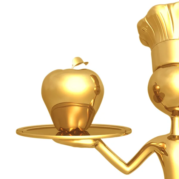 Goldener Koch serviert einen goldenen Apfel — Stockfoto