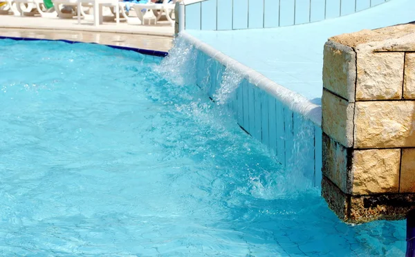 Water slide for kids at the swimming pool — Stock Photo, Image