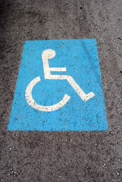 Blue road marking for disabled and invalid parking — Stock Photo, Image