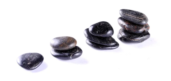 Černé kameny zen na bílém backgroundt, měkké stíny — Stock fotografie
