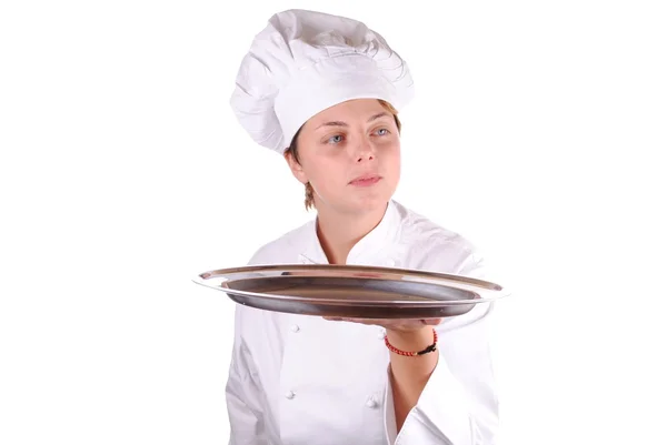 Молодая женщина шеф-повар с подносом, изолированный на белом — стоковое фото