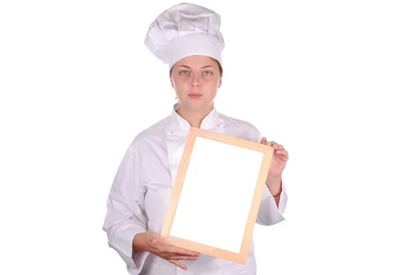 Mladé ženské šéfkuchaře zobrazeno prázdné nabídky znak, izolované na bílém — Stock fotografie