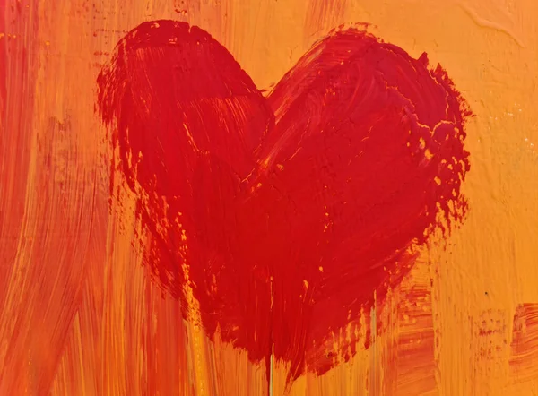 The red heart is painted with oil paint on the wall.