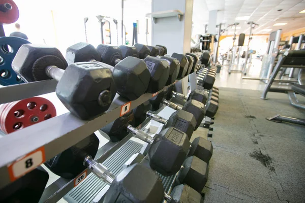 Sports dumbbells metal for bodybuilding in the gym.