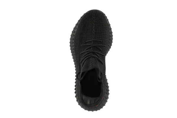 白色背景上的黑色抹布运动鞋 — 图库照片