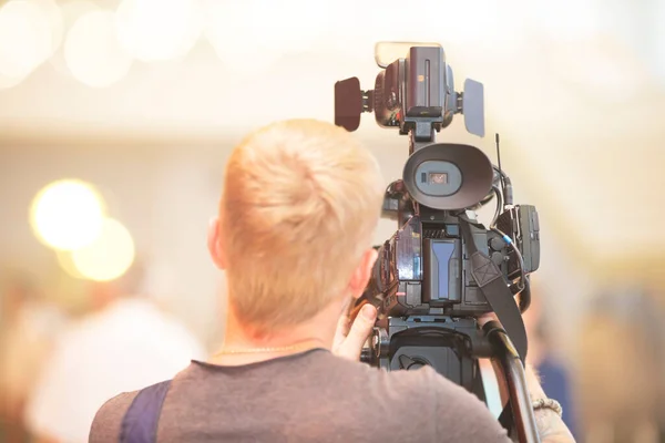 Videographer Camera Stands His Back — Fotografia de Stock