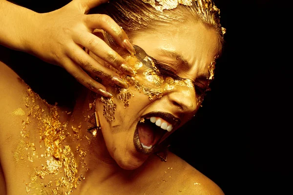 Beautiful Girl Rips Her Face Golden Makeup Black Background — Fotografia de Stock