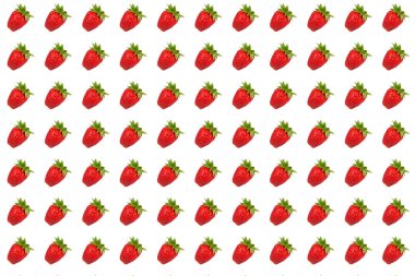 Seamless ordered strawberry texture. Lots of sweet ripe strawberries on a white background