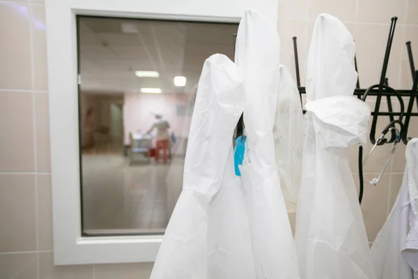 White Medical Gowns Hang Hangers Hospital — Zdjęcie stockowe