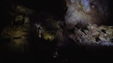 Beautiful view of the underground cave, illuminated by artificial light. 