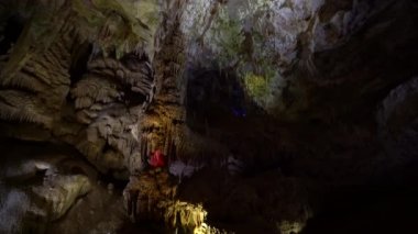 Beautiful view of the underground cave, illuminated by artificial light. 