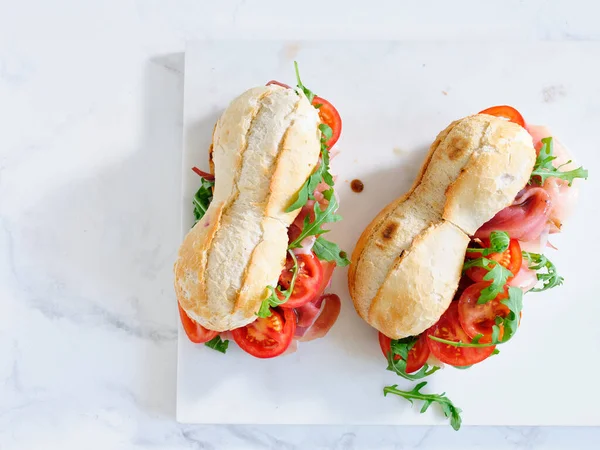 Flat Lay Tasty Sandwiches Ham Mozarella Fresh Vegetables Simple Lunch —  Fotos de Stock