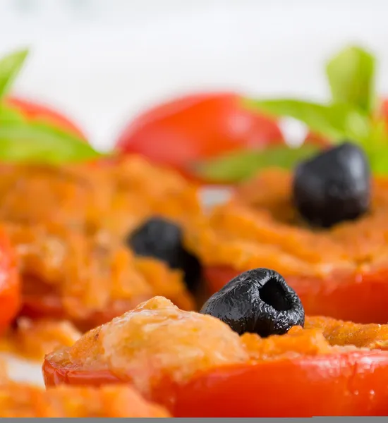 Olive on tomato — Stock Photo, Image