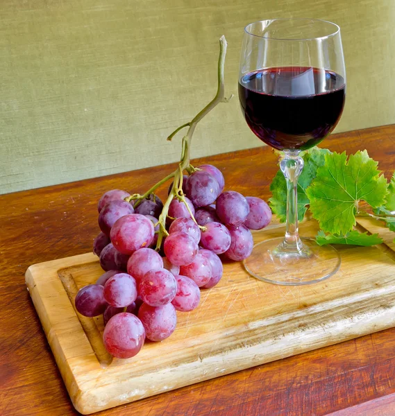 Vino, uva y hojas — Foto de Stock