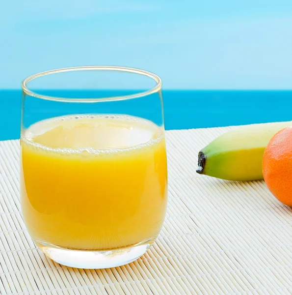 Juice by the sea — Stock Photo, Image